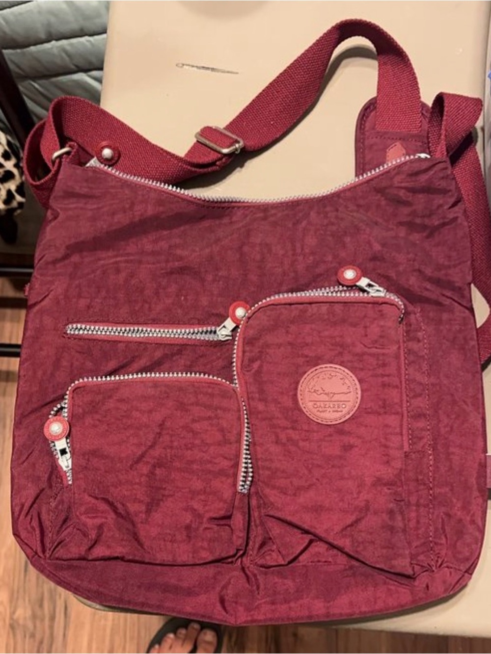 Kipling-Inspired Deep Burgundy Crossbody Bag with Multiple Zipper Pockets